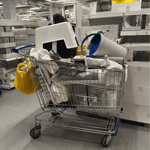 Letting go as a mother while shopping for dorm essentials, pushing a cart full of home items for my firstborn’s new beginning.