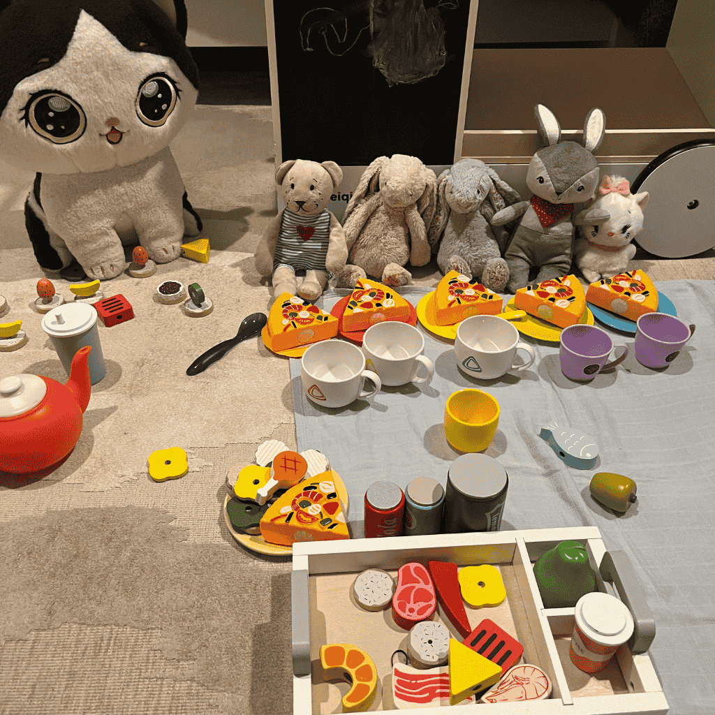 Stuffed toys having a pretend tea party, a sweet snapshot included in my reflections of an older mom.